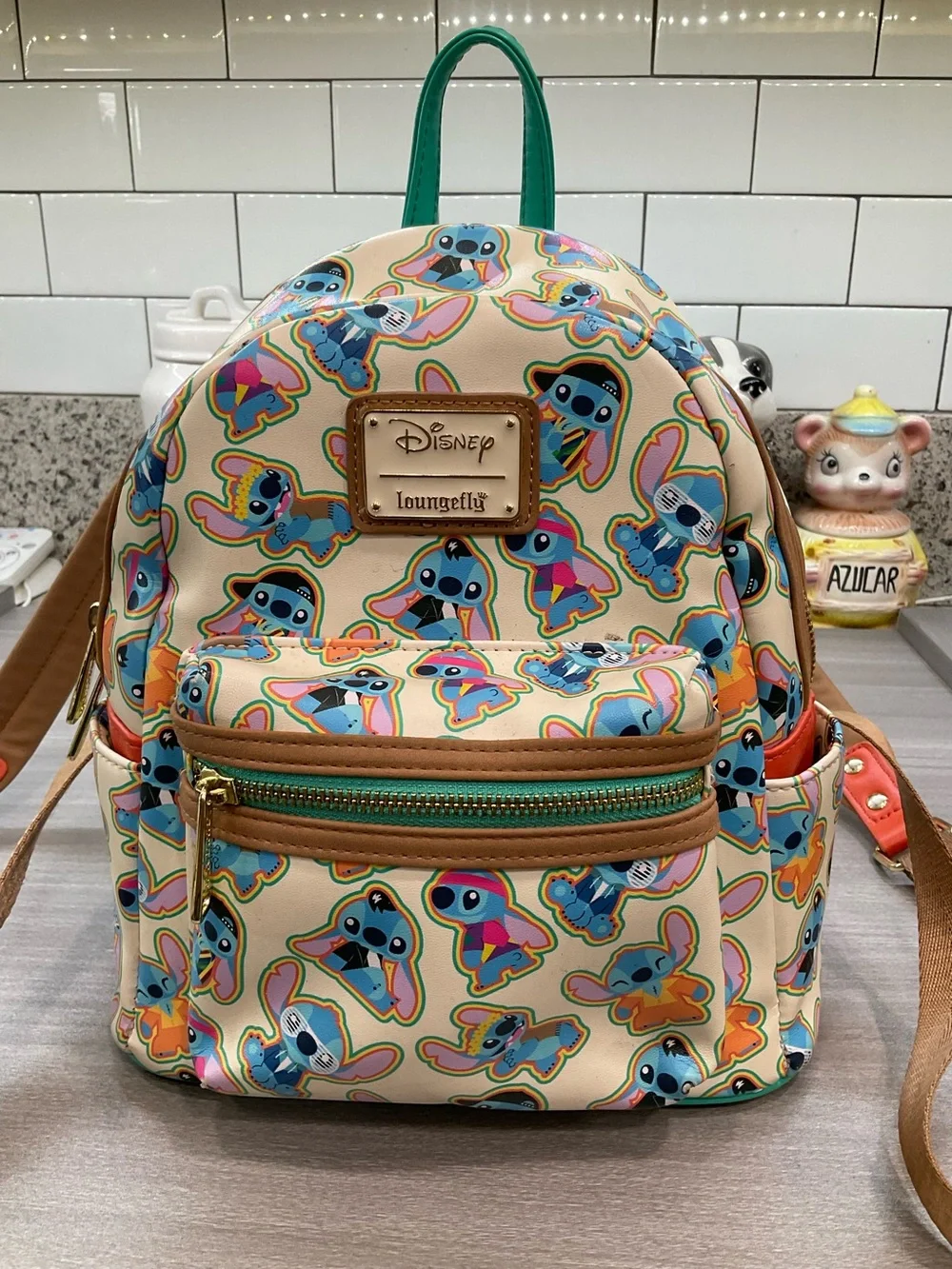 LOUNGEFLY DISNEY LILO & STITCH DECADE OUTFITS MINI BACKPACK‎